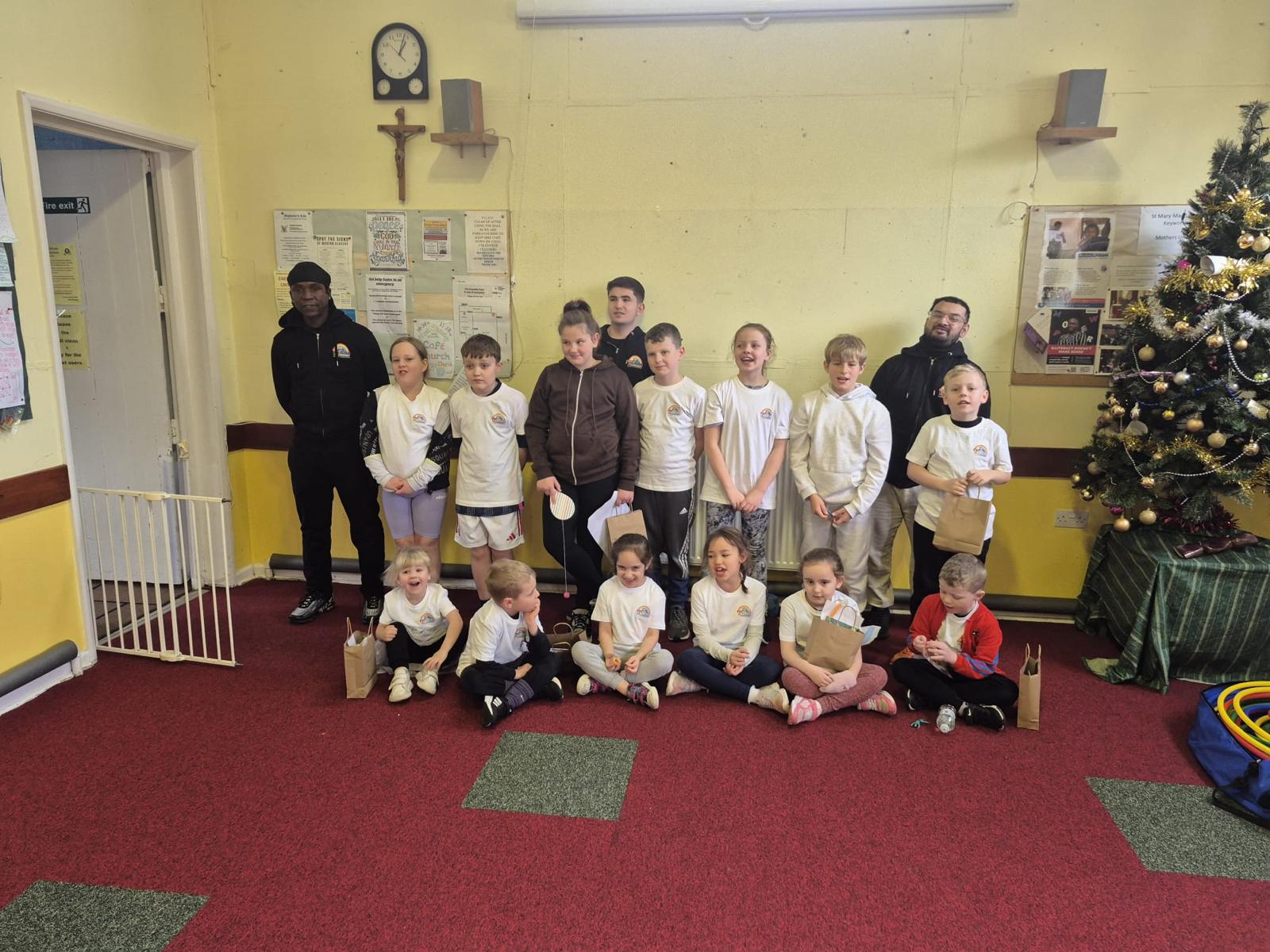 Children and coaches at a community club session